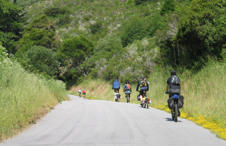 Bike tourists with trailers on Gazos Creek Rd.