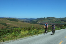 Riders climbing Stage Road above San Gregorio