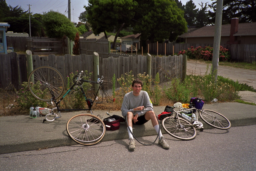 Bill fixes a flat.