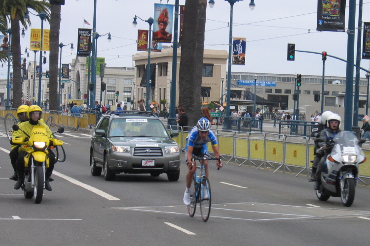 One of the Discovery racers between the leading group and the peloton.