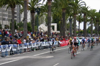 The peloton comes around the short circuit for the second time.