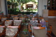 David's shirt matches the upholstery on the chairs in the loggia.