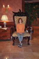 Kay sits in the Silver Legacy Chair
