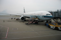 Unloading the plane from Singapore