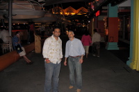 Amit and Javad on Clarke Quay looking for a dinner place