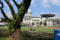 Old and new Supreme Court buildings and City Hall across the Padang