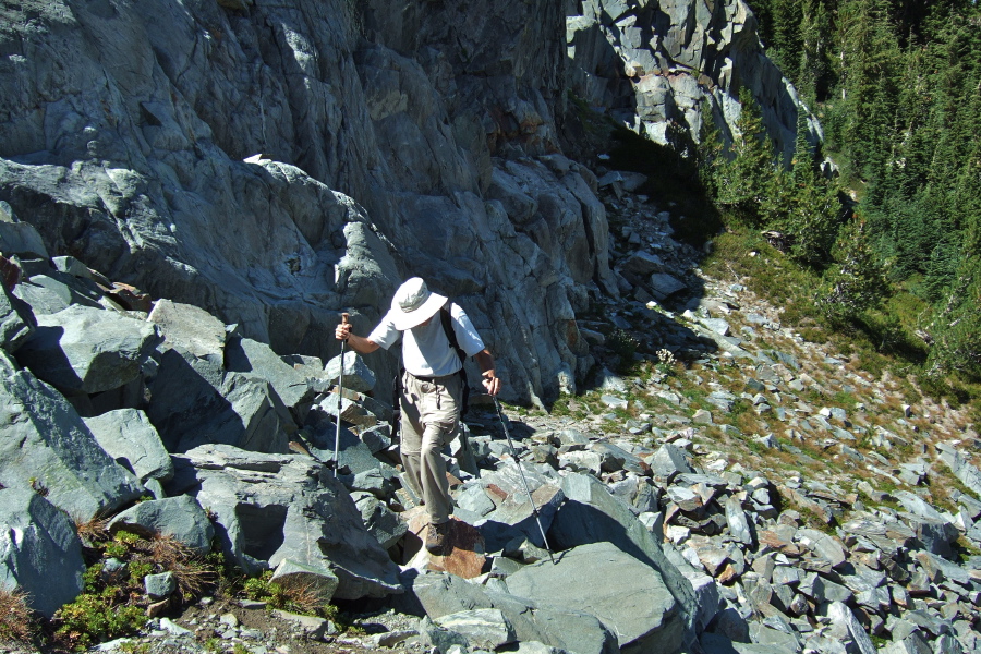 David negotiates a short section of talus above Sky Meadow.