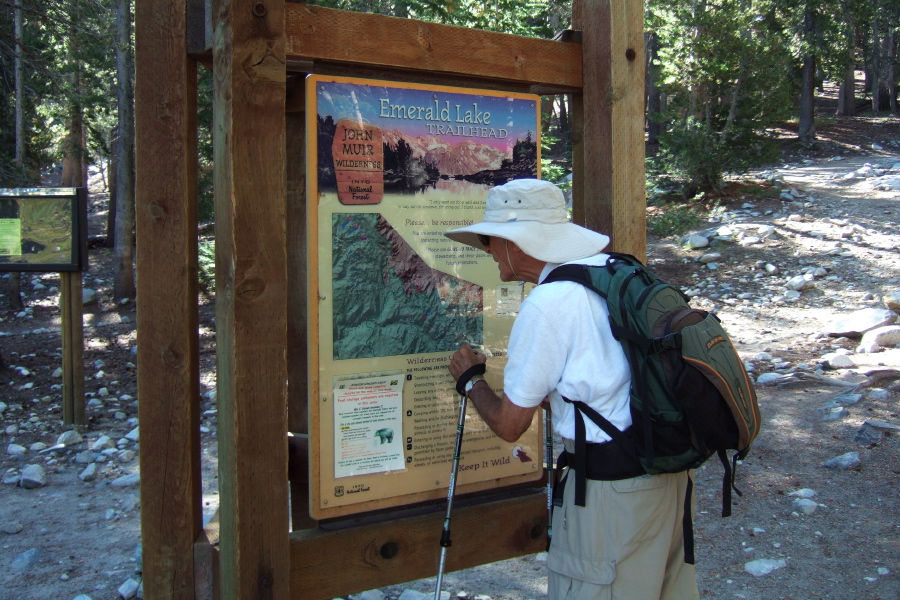 David studies the relief map at the trailhead.