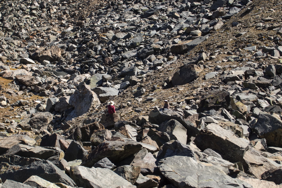 Bill and Stella wait for Frank to come out of the talus field.