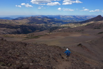 Frank descends the steep, loose trail.