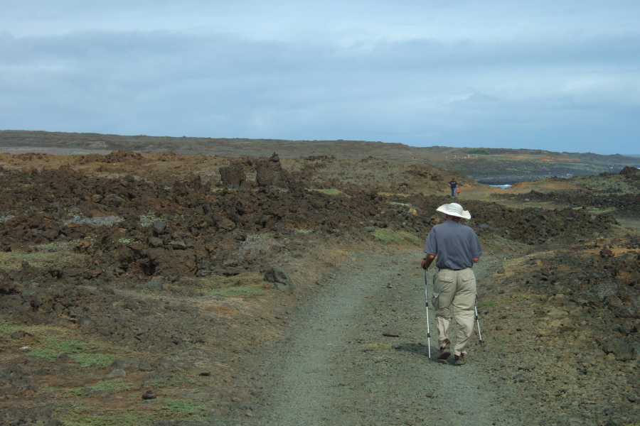 David starts down the road to Green Sand Beach (Papakolea).