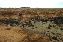 David picks his path among the sand and a'a rocks.