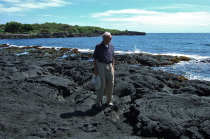 David stands on some pahoehoe flows at the black sand beach of Punalu'u.