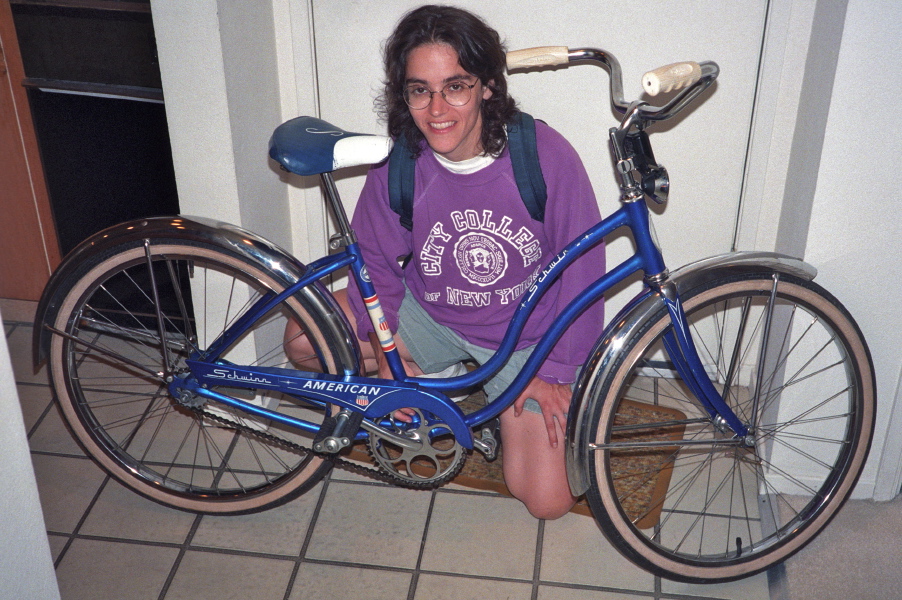 Stella and her restored Schwinn American cruiser