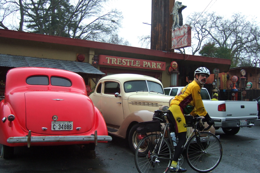 Old cars parked outside of Trestle Park.