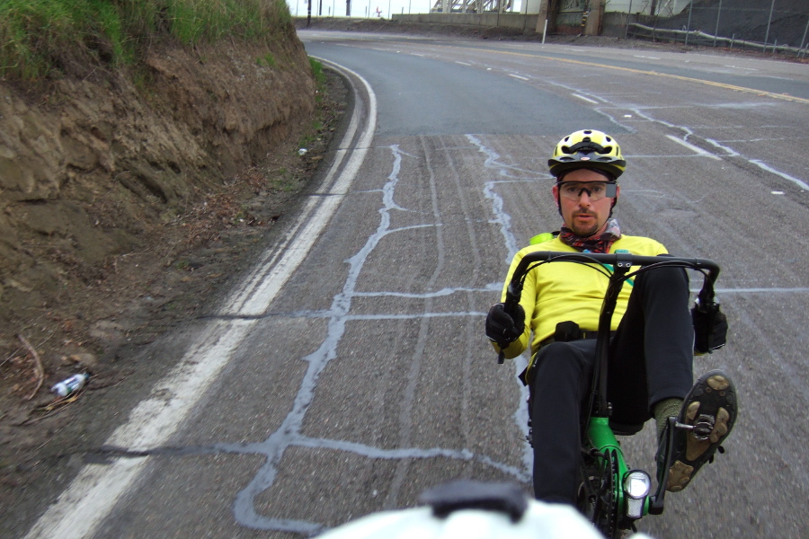 Zach tucks in behind me as we ride past the refineries on San Pablo Rd.