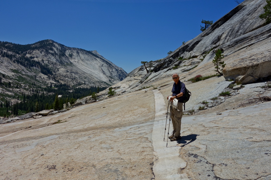David examines a long dike of dissimilar rock in the granite.