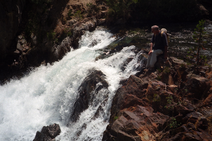 David takes a break at the outflow of Shadow Lake.