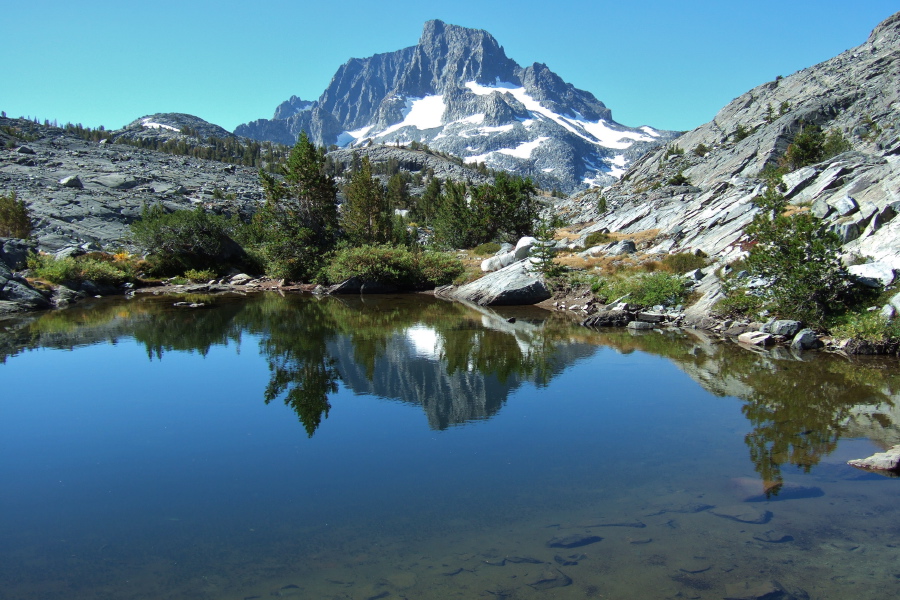 Banner Peak is reflected in one of the small ponds below Thousand Island Lake.