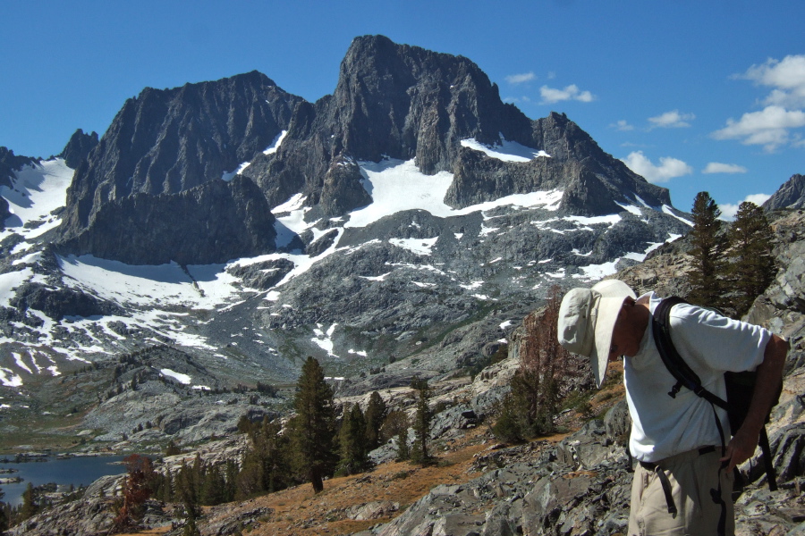 David shoulders his pack after a rest to enjoy the view.