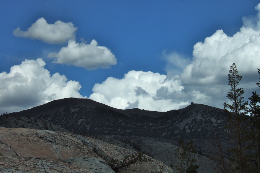 Clouds also swirl about San Joaquin Mountain and the Two Teats.