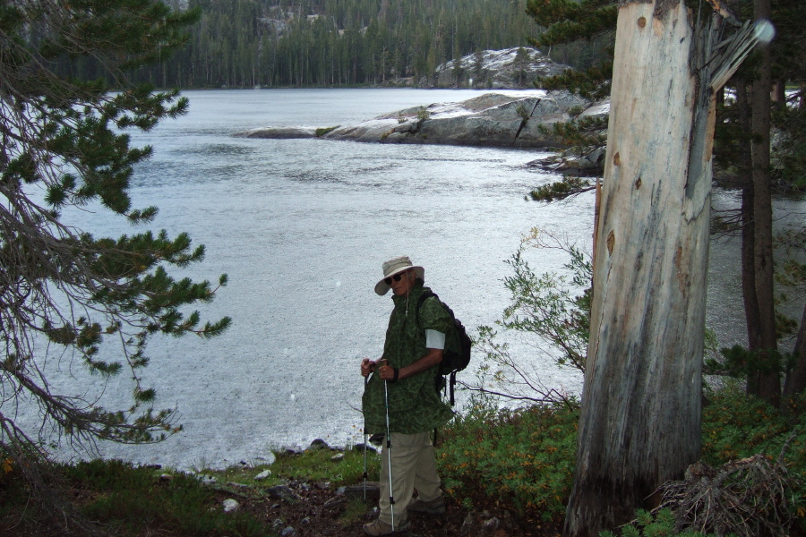 David stays dry under his poncho and hat at Shadow Lake.