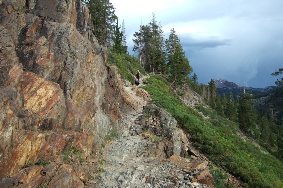 Hiking back up past the cliffs after the rain has finished.