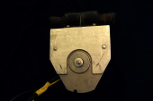 Motor on its mounting bracket, front view.