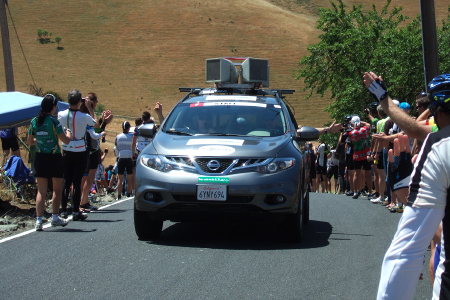 Race announcement car comes by on Morgan Territory Road