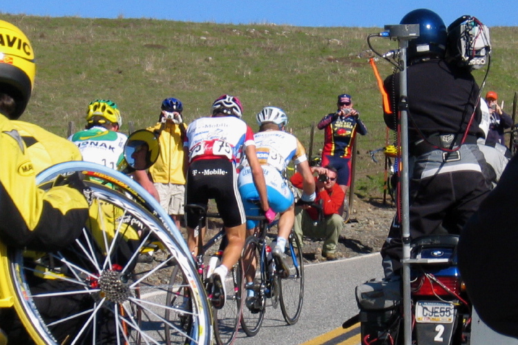 Landis, Kohl, and Leipheimer motor on to the summit.