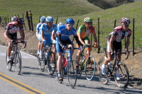 Stuart O'Grady (CSC) leads a bunch to the summit of Sierra Rd.