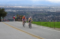 Race leader, Levi Leipheimer, leads two others up Sierra Rd.