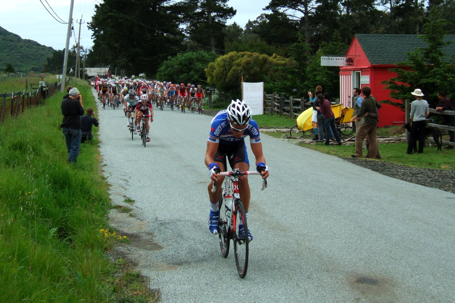 A few racers are out in front on this flat preamble to the climb.