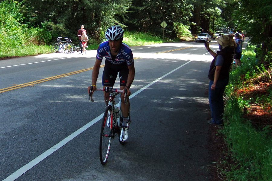 A Quick-Step rider climbs alone.