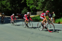 Yaroslav Popovych leads a group including the tour leader down Empire Grade.