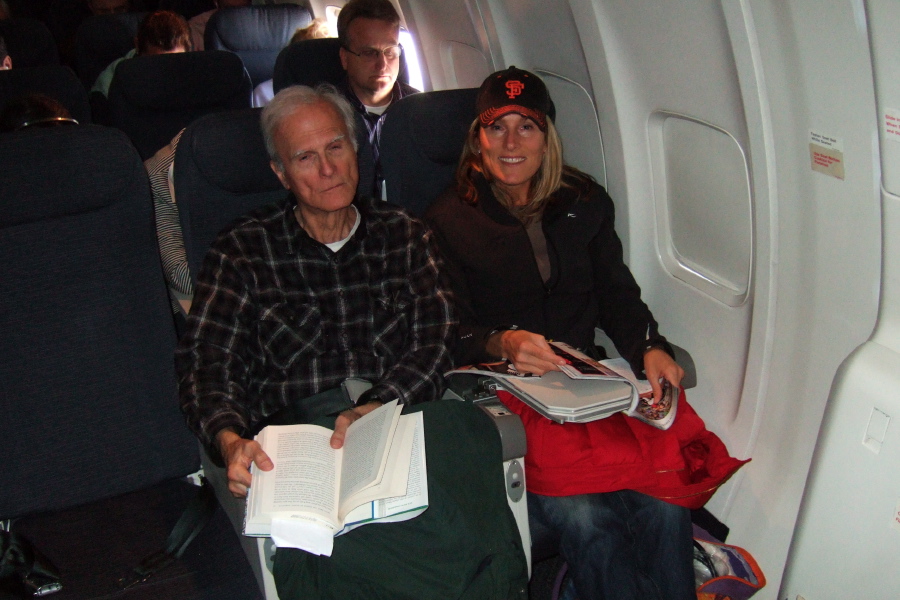 David and Laura in their seats on the plane