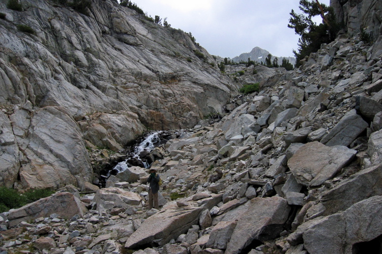 David climbing the faint use trail to upper Treasure Lakes.