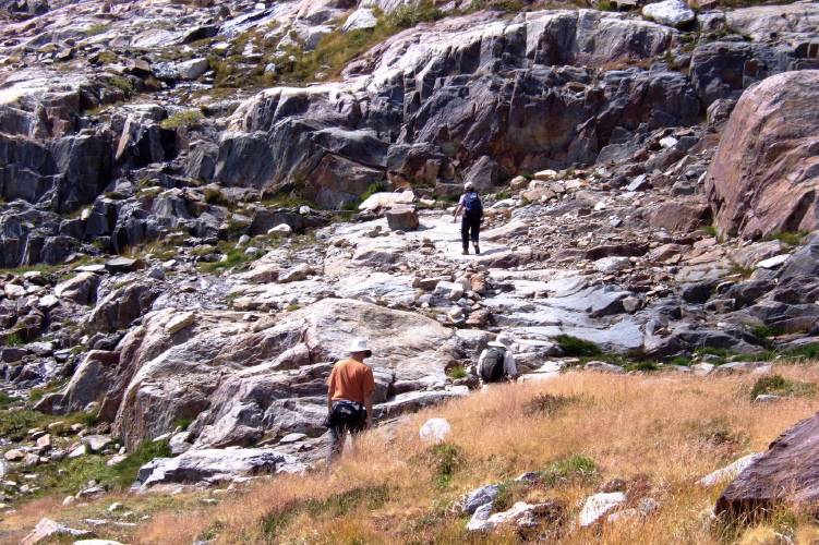 Stella, David, and Frank look for the trail.