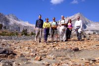The intrepid group begins their hike from the northern shore of Saddlebag Lake.
