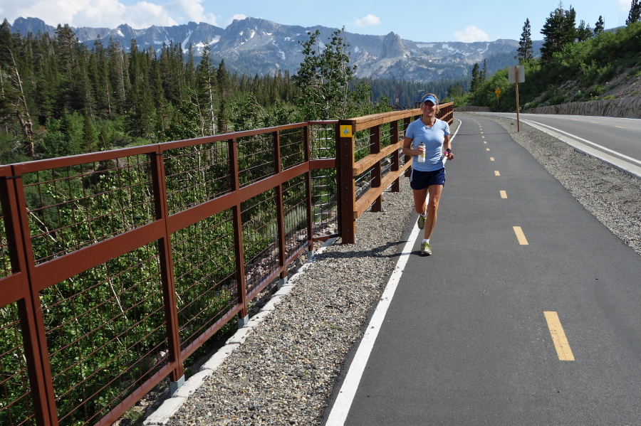 Laura runs down the Lakes Basin Path