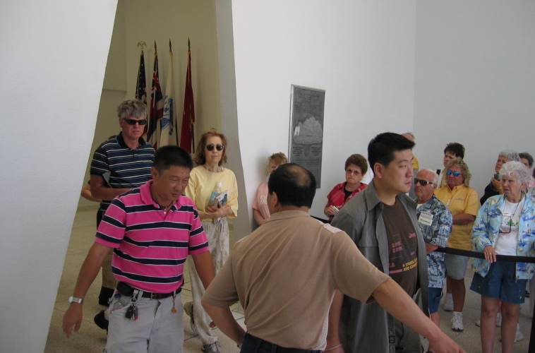 Kay and other tourists filing onto the memorial.