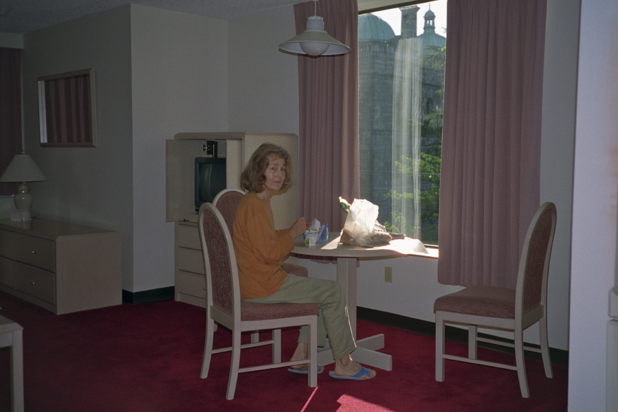 Kay eats her McDougalls breakfast in the hotel room at the Embassy Inn.