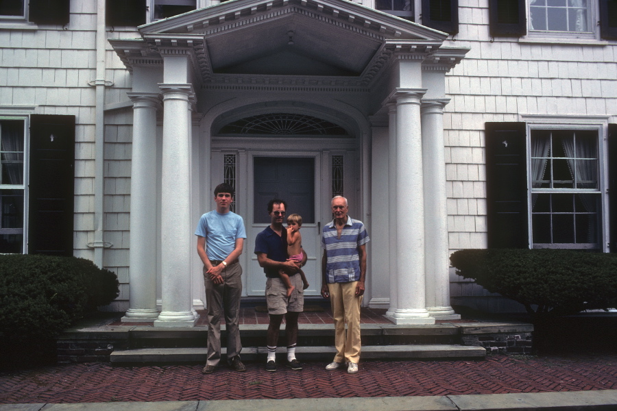 Bill, Jan, ?, and Uncle Dell in front of grandmother's house