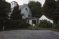 David in front of the house he lived in until 12 years old