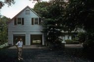 David in front of caretaker's house