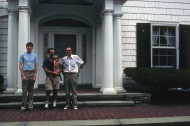 Bill, Jan, ?, and David in front of grandmother's old house.