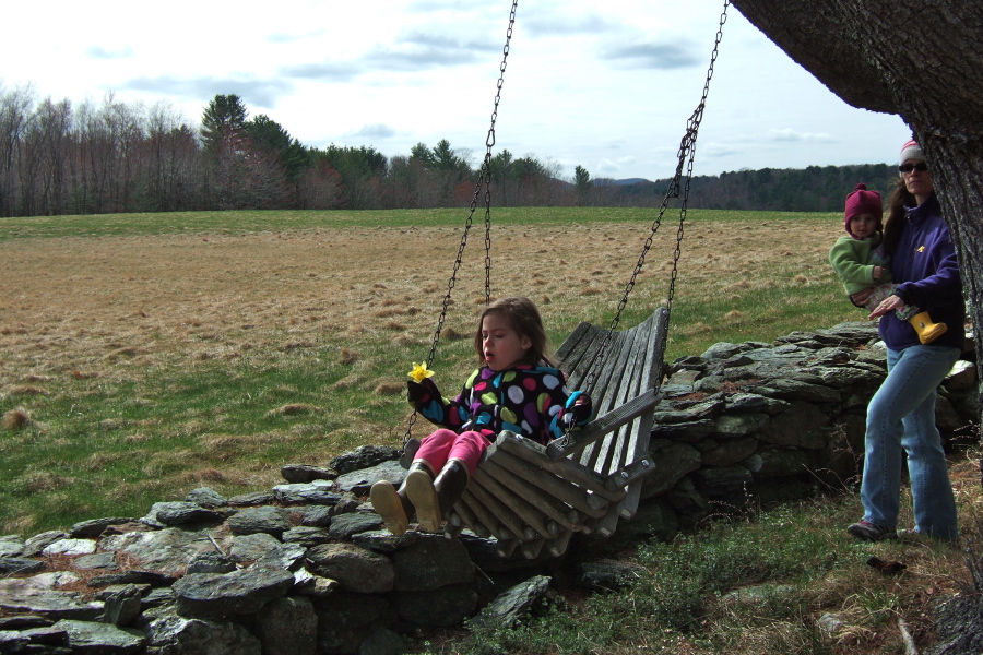 Camille enjoys a swing.