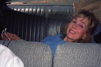 Kay lying in the back seat of the Buick