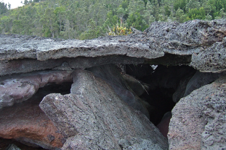 A thin layer of crust atop a void.