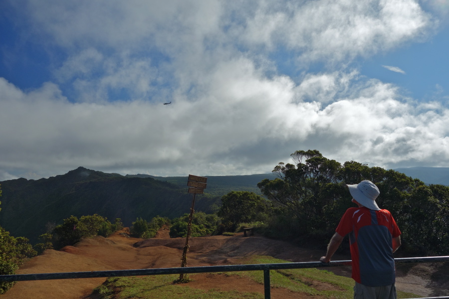 David considers the sign at Pu'u o Kila Lookout.